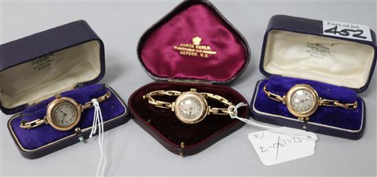 Three cased early 20th century 9ct gold wrist watches including a pair.